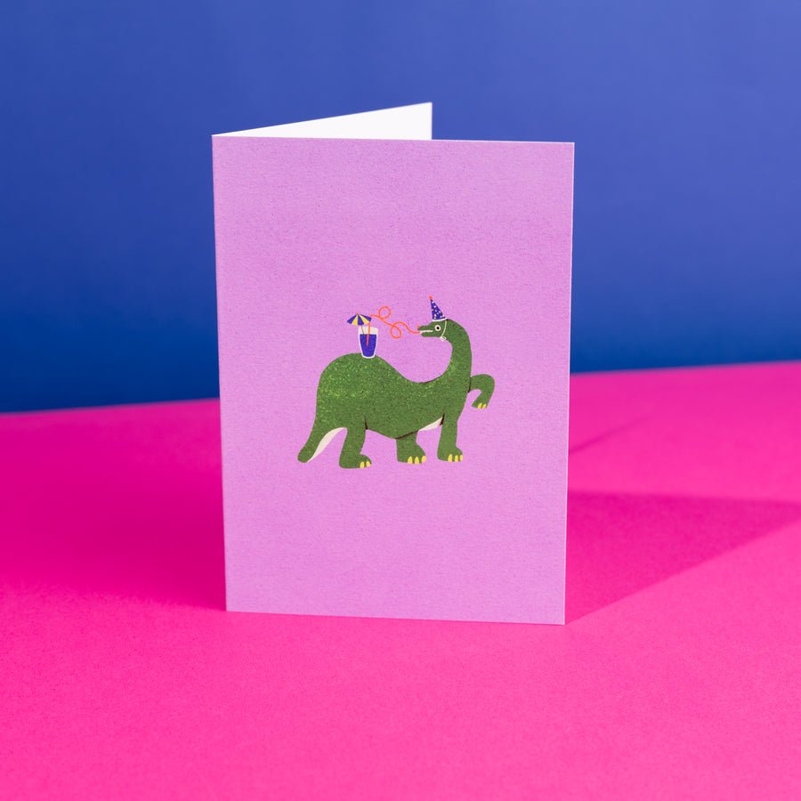Dino Party Greetings Card by Zsófia Győrfi